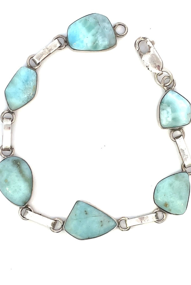 view of sterling silver bracelet with blue stones and lobster clasp