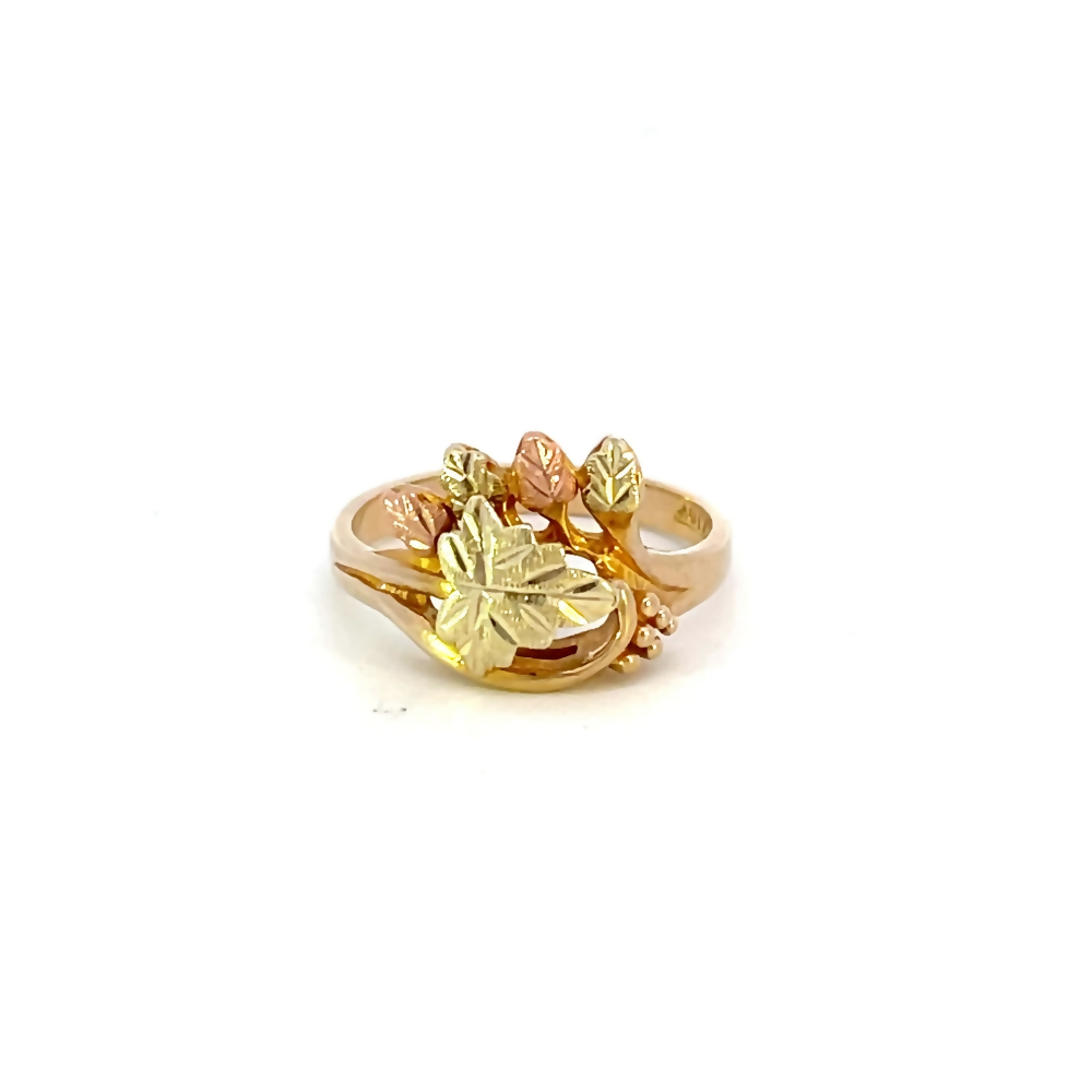 front view of black hills gold ring with iconic leaf design 