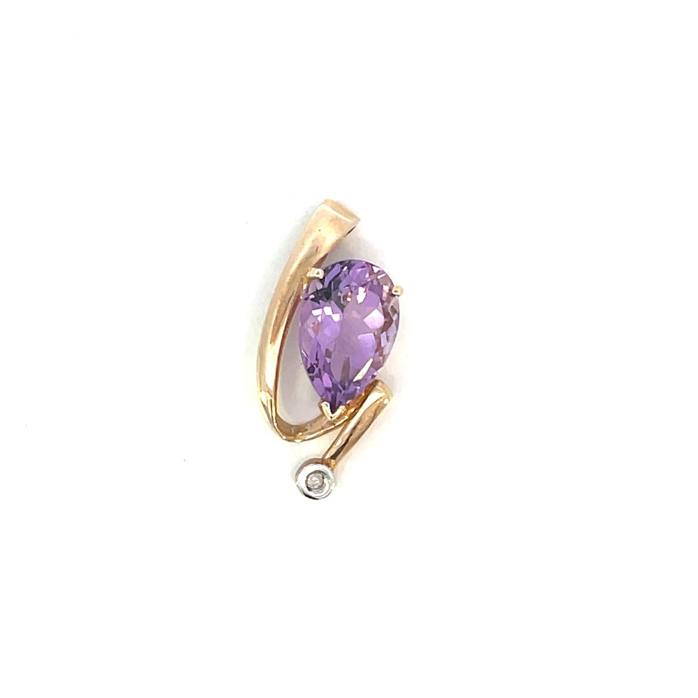 detail view of 10k yellow gold amethyst and diamond pendant