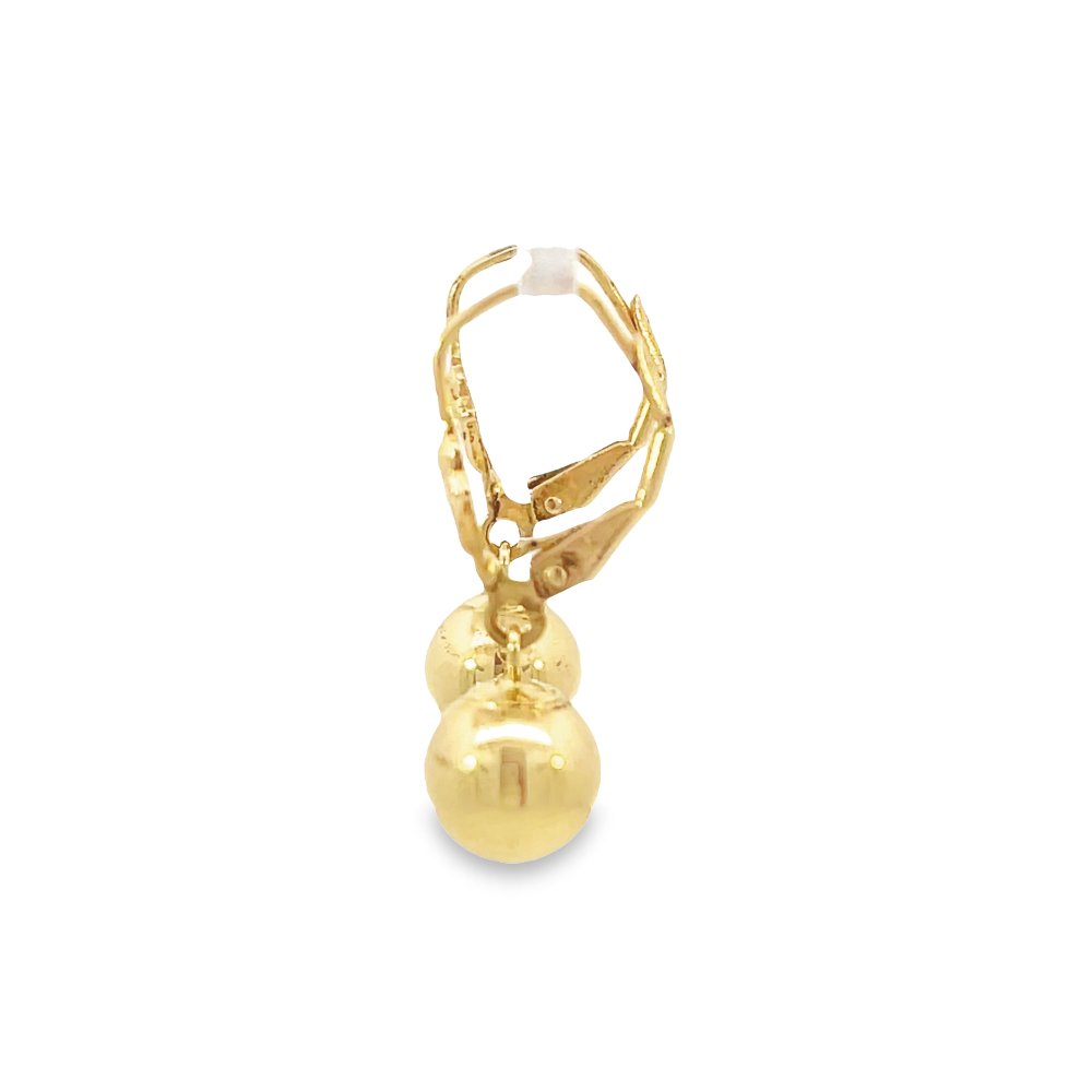 side view of gold ball drop earrings on euro-wires