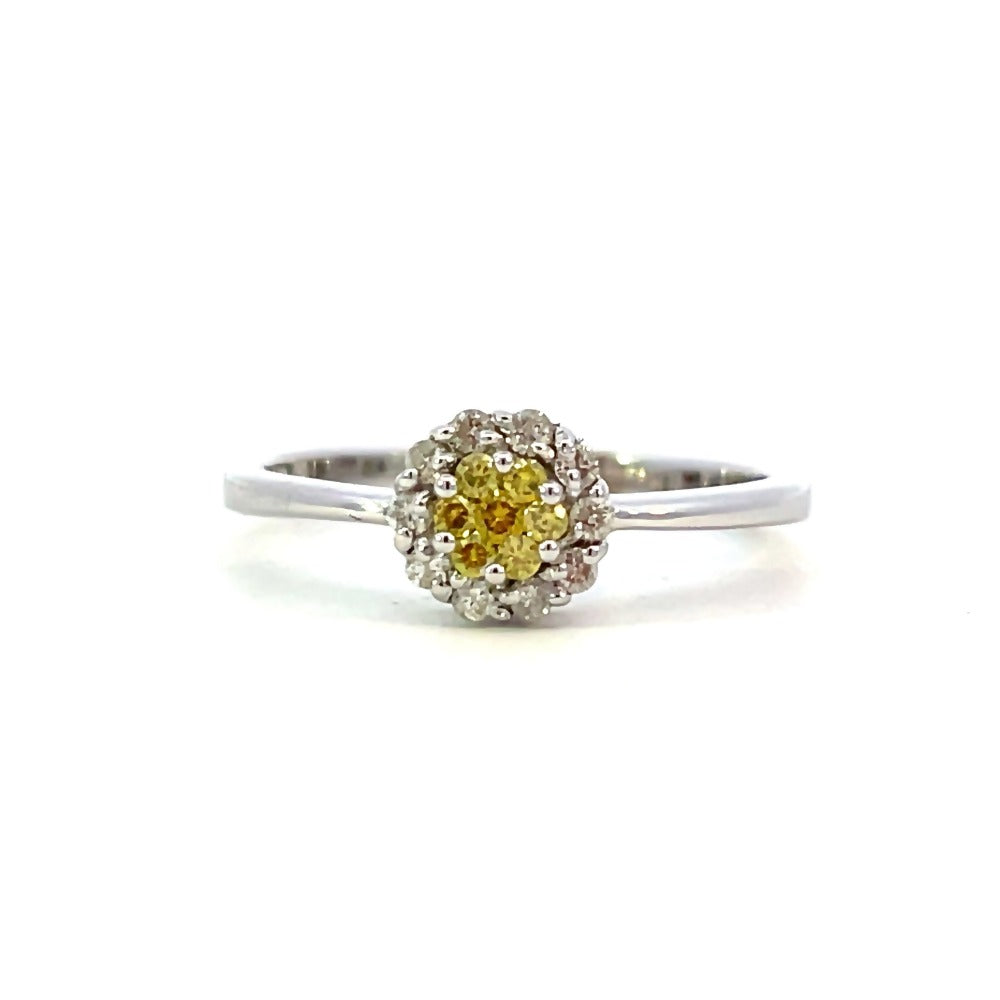 detail view of 14kw yellow and white diamond cluster style ring