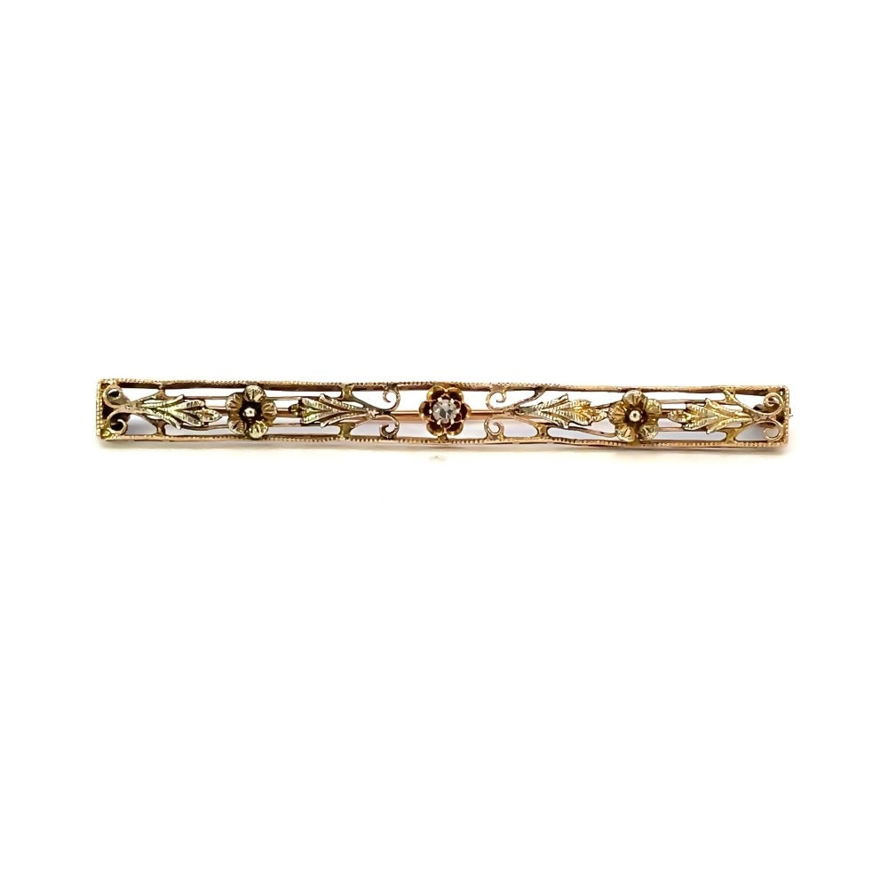 front view of 10ky antique pin with diamond accent