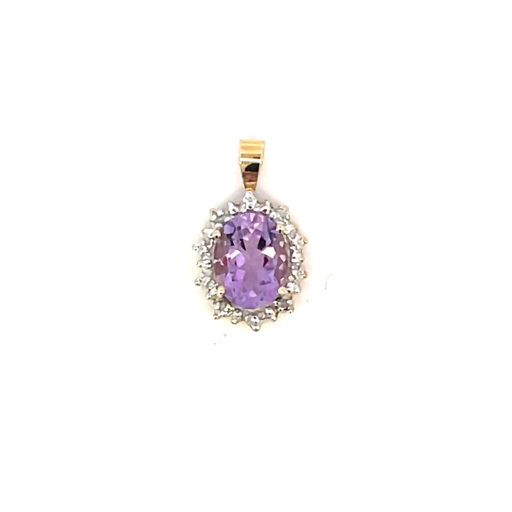 detail view of 10ky amethyst and diamond halo style pendant