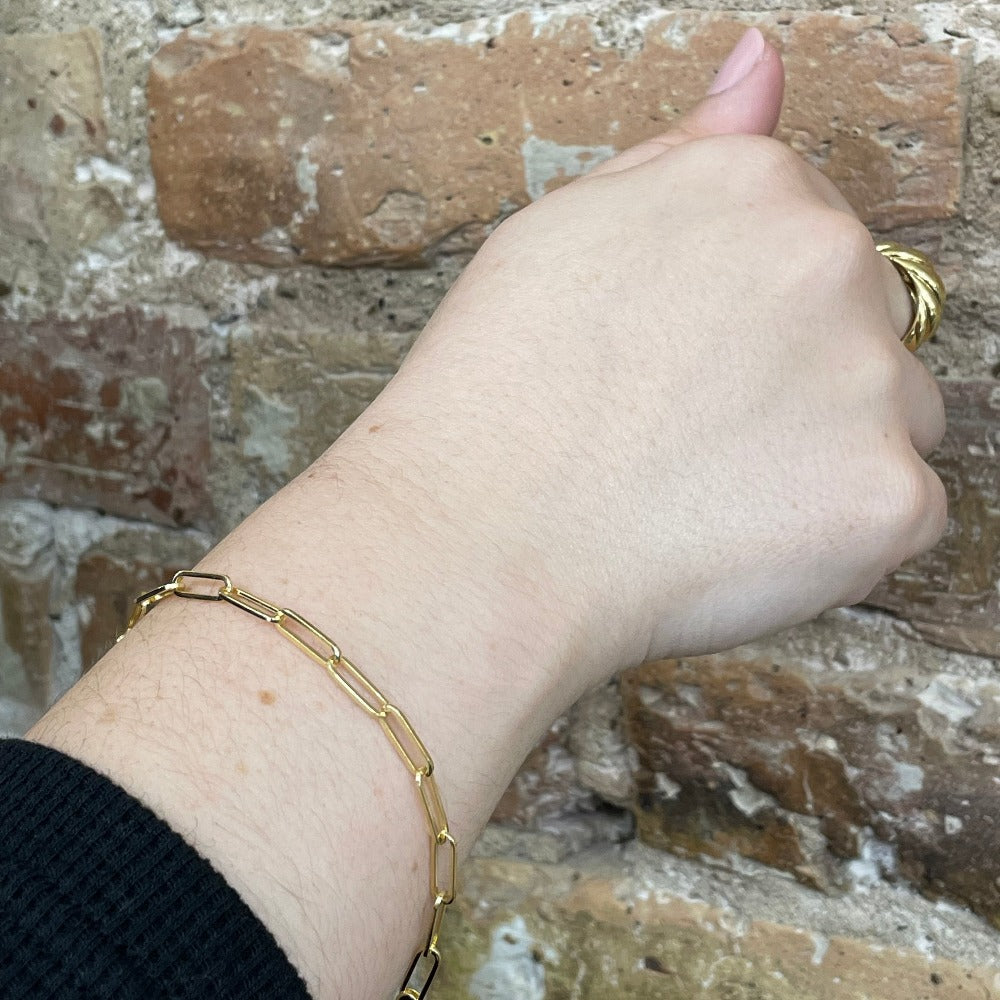 14k yellow gold paper clip chain on wrist