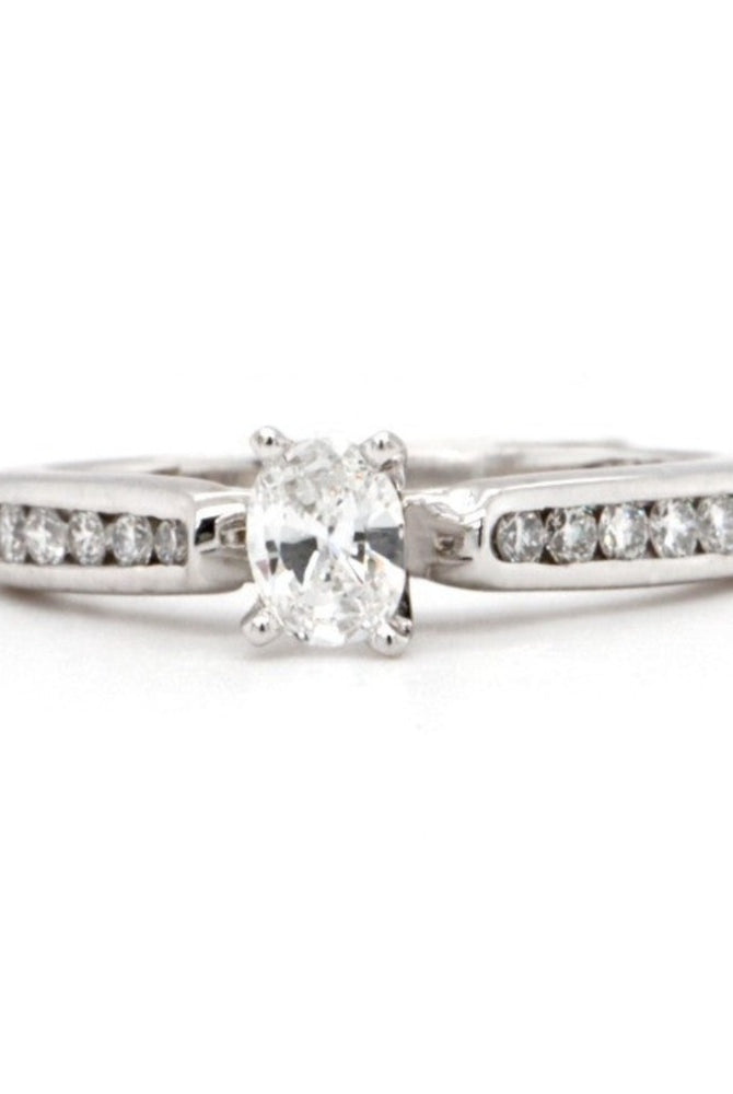 Oval Diamond Engagement Ring with Channel Set accent diamonds