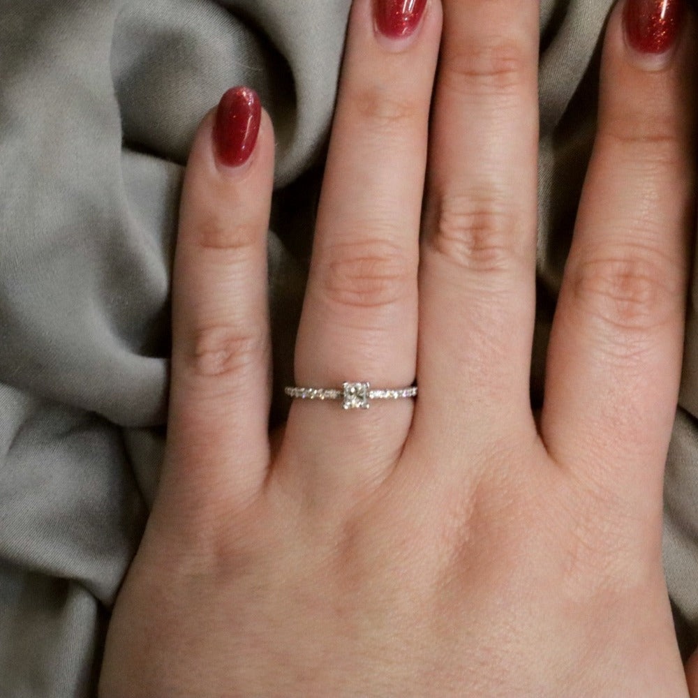 Princess Cut Engagement Ring with Shared Prong Diamond Band on hand