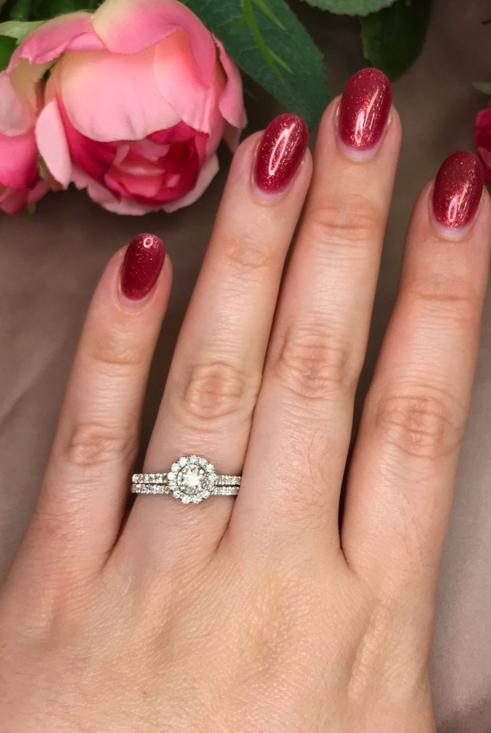 Round Halo Style Engagement Ring with Matching Wedding Band on Model