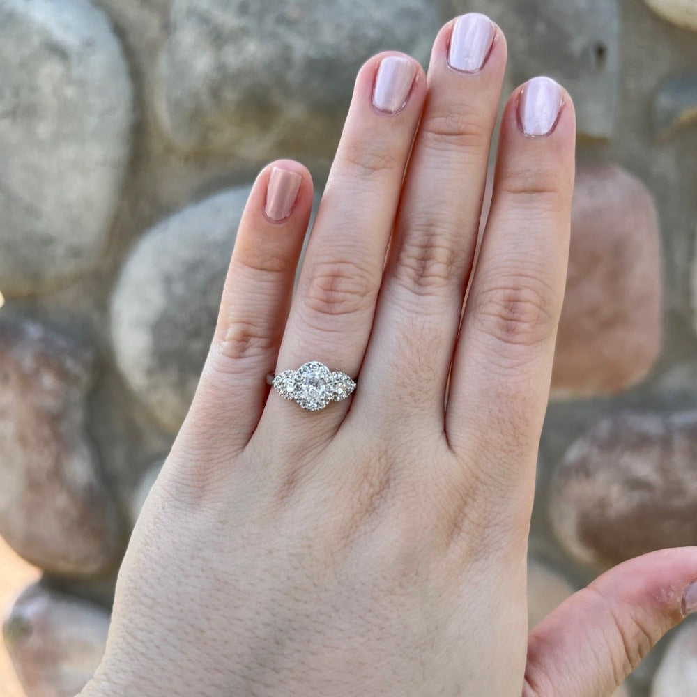three stone oval halo engagement rings
