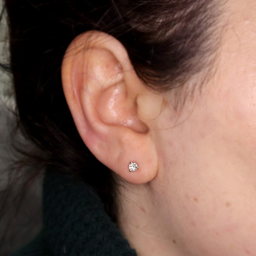 1/3CTW SallyK Diamond stud earrings on model 