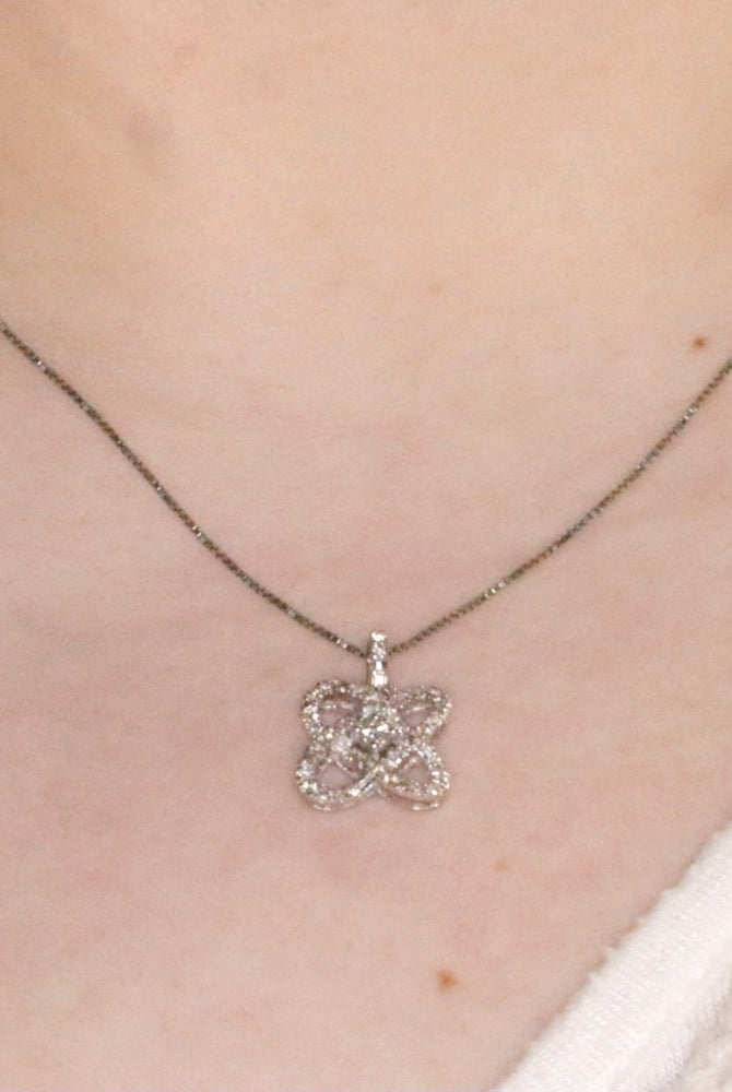 Sterling Silver & Diamond Infinity Heart Love Knot Pendant on model
